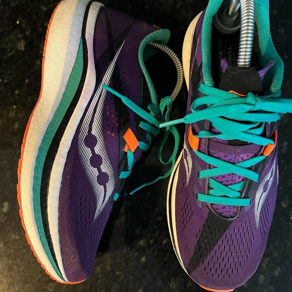 Saucony Women's Purple Running Shoes with Teal and Orange Accents